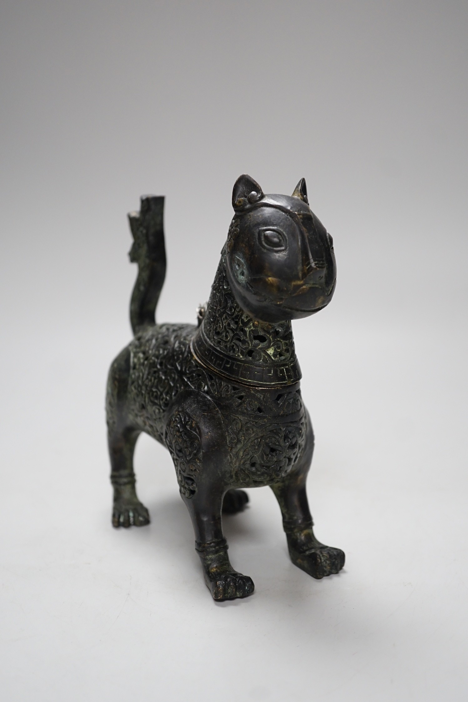 An early 20th century cast bronze Indonesian ‘lion dog’ incense burner. 18cm high